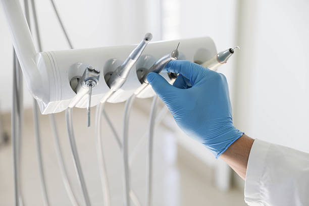 Professional Emergency Dentist technician working in Woodbury, MN